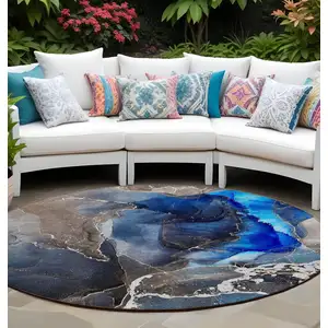 Photo of 8' Round Blue Round Abstract Washable Non Skid Indoor Outdoor Area Rug