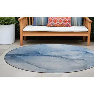 Photo of 8' Round Blue Round Abstract Washable Non Skid Indoor Outdoor Area Rug