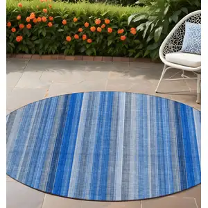 Photo of 8' Round Blue Round Striped Washable Non Skid Indoor Outdoor Area Rug