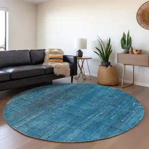 Photo of 8' Round Blue Round Striped Washable Non Skid Indoor Outdoor Area Rug