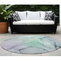 Photo of 8' Round Blue and Gray Round Abstract Washable Non Skid Indoor Outdoor Area Rug