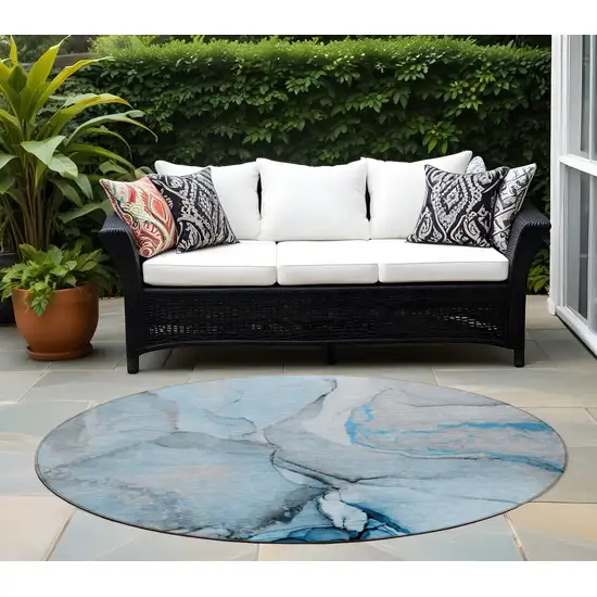 8' Round Blue and Ivory Round Abstract Washable Non Skid Indoor Outdoor Area Rug Photo 1