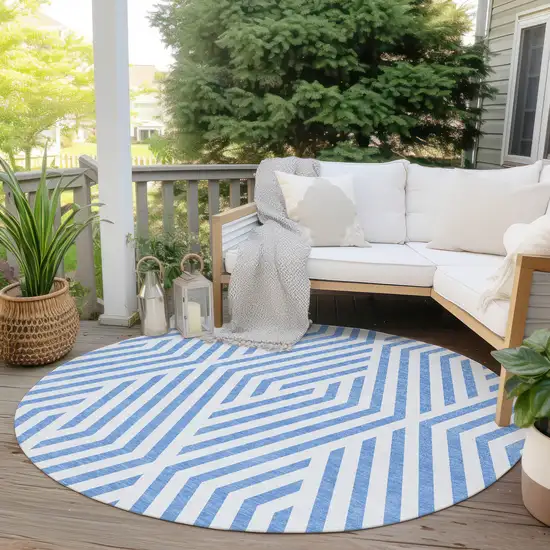 8' Round Blue and Ivory Round Geometric Washable Non Skid Indoor Outdoor Area Rug Photo 8