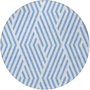 Photo of 8' Round Blue and Ivory Round Geometric Washable Non Skid Indoor Outdoor Area Rug