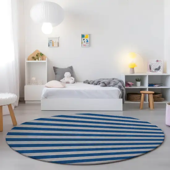 8' Round Blue and Ivory Round Striped Washable Non Skid Indoor Outdoor Area Rug Photo 9