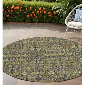 Photo of 8' Round Blue and Orange Round Floral Washable Non Skid Indoor Outdoor Area Rug