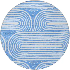 Photo of 8' Round Blue and White Round Abstract Washable Non Skid Indoor Outdoor Area Rug