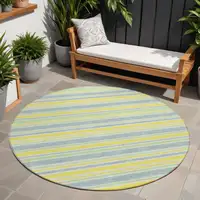 Photo of 8' Round Blue and Yellow Round Striped Washable Non Skid Indoor Outdoor Area Rug