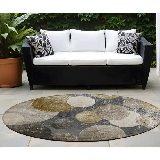 Brown Beige and Ivory Round Abstract Washable Non Skid Indoor Outdoor Area Rug Photo 1