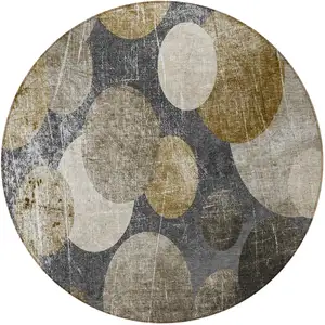 Photo of 8' Round Brown Beige and Ivory Round Abstract Washable Non Skid Indoor Outdoor Area Rug