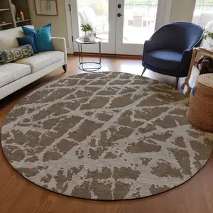 Photo of 8' Round Brown Round Abstract Washable Non Skid Indoor Outdoor Area Rug