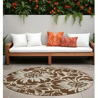 Photo of 8' Round Brown and Ivory Round Floral Washable Non Skid Indoor Outdoor Area Rug