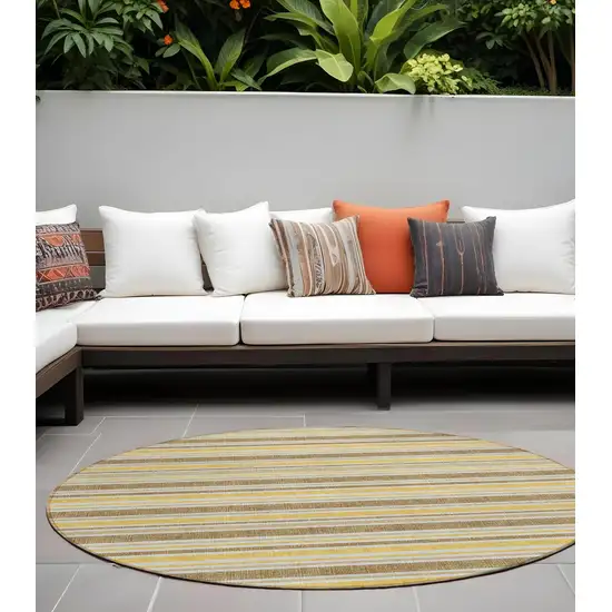 8' Round Brown and Orange Round Striped Washable Non Skid Indoor Outdoor Area Rug Photo 1