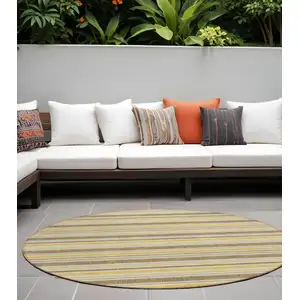 Photo of 8' Round Brown and Orange Round Striped Washable Non Skid Indoor Outdoor Area Rug