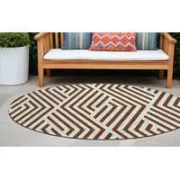 Photo of 8' Round Brown and White Round Geometric Washable Non Skid Indoor Outdoor Area Rug