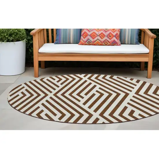 8' Round Brown and White Round Geometric Washable Non Skid Indoor Outdoor Area Rug Photo 1