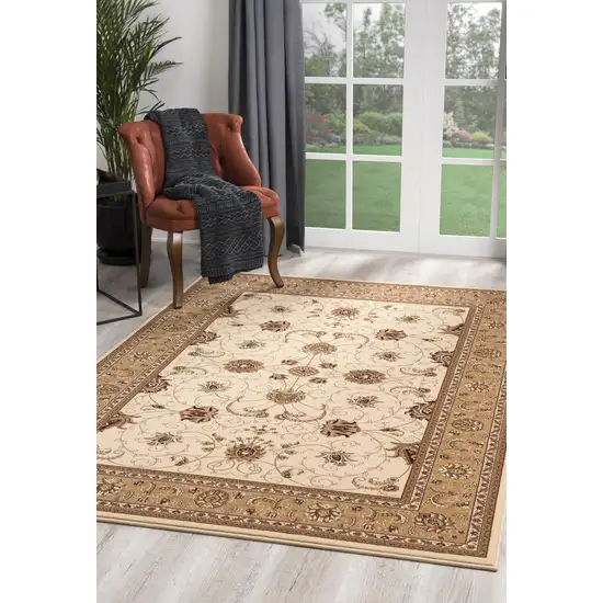 5' Round Cream and Tan Ornate Border Area Rug Photo 7