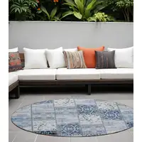 Photo of 8' Round Denim Blue Round Patchwork Washable Non Skid Indoor Outdoor Area Rug