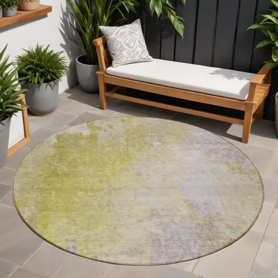 8' Round Gold Beige and Purple Round Abstract Washable Non Skid Indoor Outdoor Area Rug Photo 1