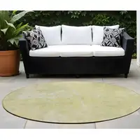 Photo of 8' Round Gold Round Abstract Washable Non Skid Indoor Outdoor Area Rug