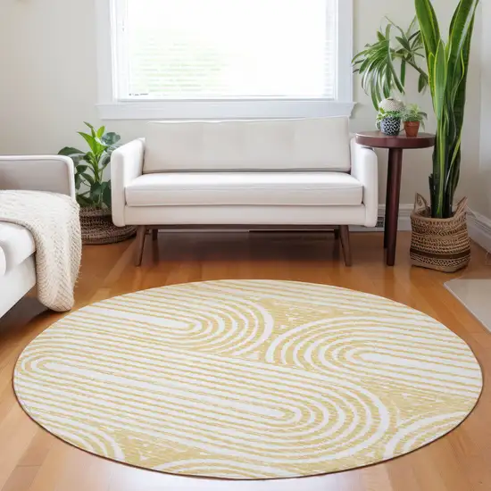 8' Round Gold and White Round Abstract Washable Non Skid Indoor Outdoor Area Rug Photo 9