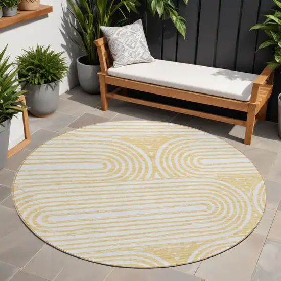 8' Round Gold and White Round Abstract Washable Non Skid Indoor Outdoor Area Rug Photo 1