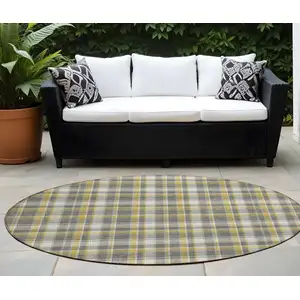 Photo of 8' Round Gray Yellow and White Round Plaid Washable Non Skid Indoor Outdoor Area Rug