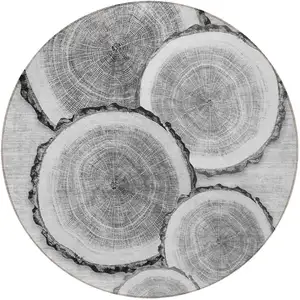 Photo of 8' Round Gray and Black Round Faux Bois Washable Non Skid Indoor Outdoor Area Rug