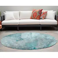 Photo of 8' Round Gray and Ivory Round Abstract Washable Non Skid Indoor Outdoor Area Rug