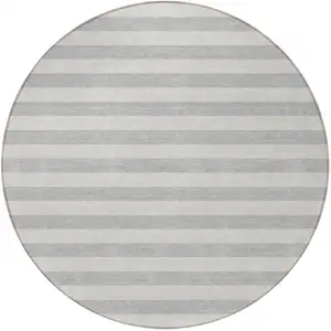 Photo of 8' Round Gray and Ivory Round Striped Washable Non Skid Indoor Outdoor Area Rug