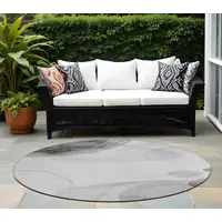 Photo of 8' Round Gray and Light Gray Round Abstract Washable Non Skid Indoor Outdoor Area Rug