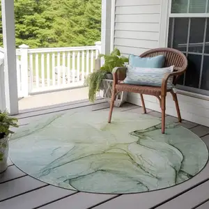 Photo of 8' Round Green Round Abstract Washable Non Skid Indoor Outdoor Area Rug