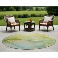 Photo of 8' Round Green Round Abstract Washable Non Skid Indoor Outdoor Area Rug