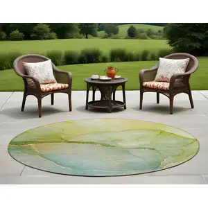 Photo of 8' Round Green Round Abstract Washable Non Skid Indoor Outdoor Area Rug