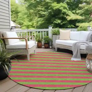 Photo of 8' Round Green and Red Round Striped Washable Non Skid Indoor Outdoor Area Rug