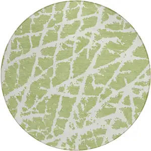 Photo of 8' Round Green and White Round Abstract Washable Non Skid Indoor Outdoor Area Rug