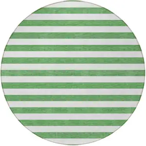 Photo of 8' Round Green and White Round Striped Washable Non Skid Indoor Outdoor Area Rug