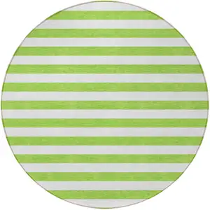 Photo of 8' Round Green and White Round Striped Washable Non Skid Indoor Outdoor Area Rug