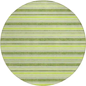 Photo of 8' Round Green and Yellow Round Striped Washable Non Skid Indoor Outdoor Area Rug