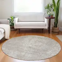 Photo of 8' Round Ivory Round Abstract Washable Non Skid Indoor Outdoor Area Rug