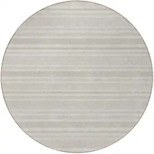 Photo of 8' Round Ivory Round Striped Washable Non Skid Indoor Outdoor Area Rug