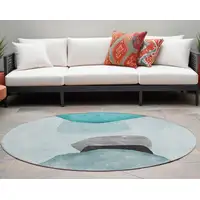 Photo of 8' Round Ivory Teal and Gray Round Abstract Washable Non Skid Indoor Outdoor Area Rug