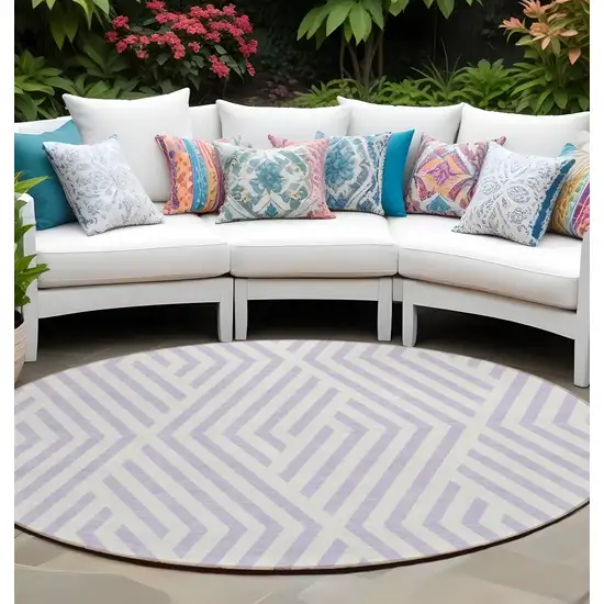 8' Round Lavender and Ivory Round Geometric Washable Non Skid Indoor Outdoor Area Rug Photo 1