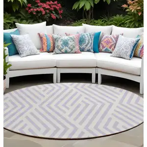 Photo of 8' Round Lavender and Ivory Round Geometric Washable Non Skid Indoor Outdoor Area Rug