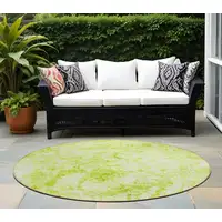 Photo of 8' Round Lime Green Round Abstract Washable Non Skid Indoor Outdoor Area Rug