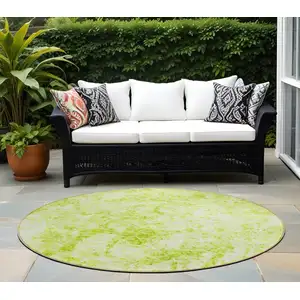 Photo of 8' Round Lime Green Round Abstract Washable Non Skid Indoor Outdoor Area Rug