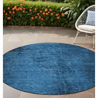 Photo of 8' Round Navy Blue Round Abstract Washable Non Skid Indoor Outdoor Area Rug