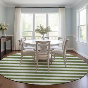 Photo of 8' Round Olive Green Round Striped Washable Non Skid Indoor Outdoor Area Rug