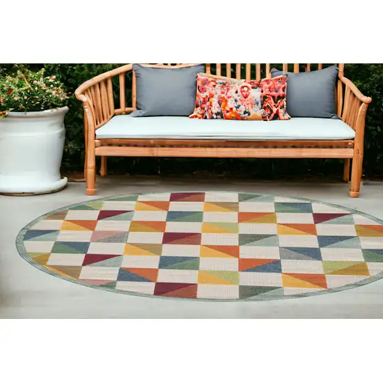 Orange And Ivory Round Geometric Stain Resistant Indoor Outdoor Area Rug Photo 1