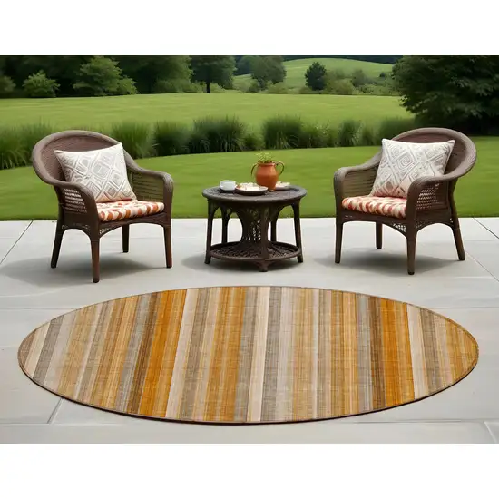 8' Round Orange Ivory and Gray Round Striped Washable Non Skid Indoor Outdoor Area Rug Photo 1